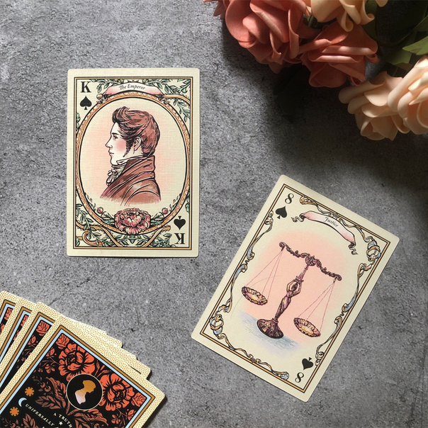 Two Tarot Cards on a Gray Surface